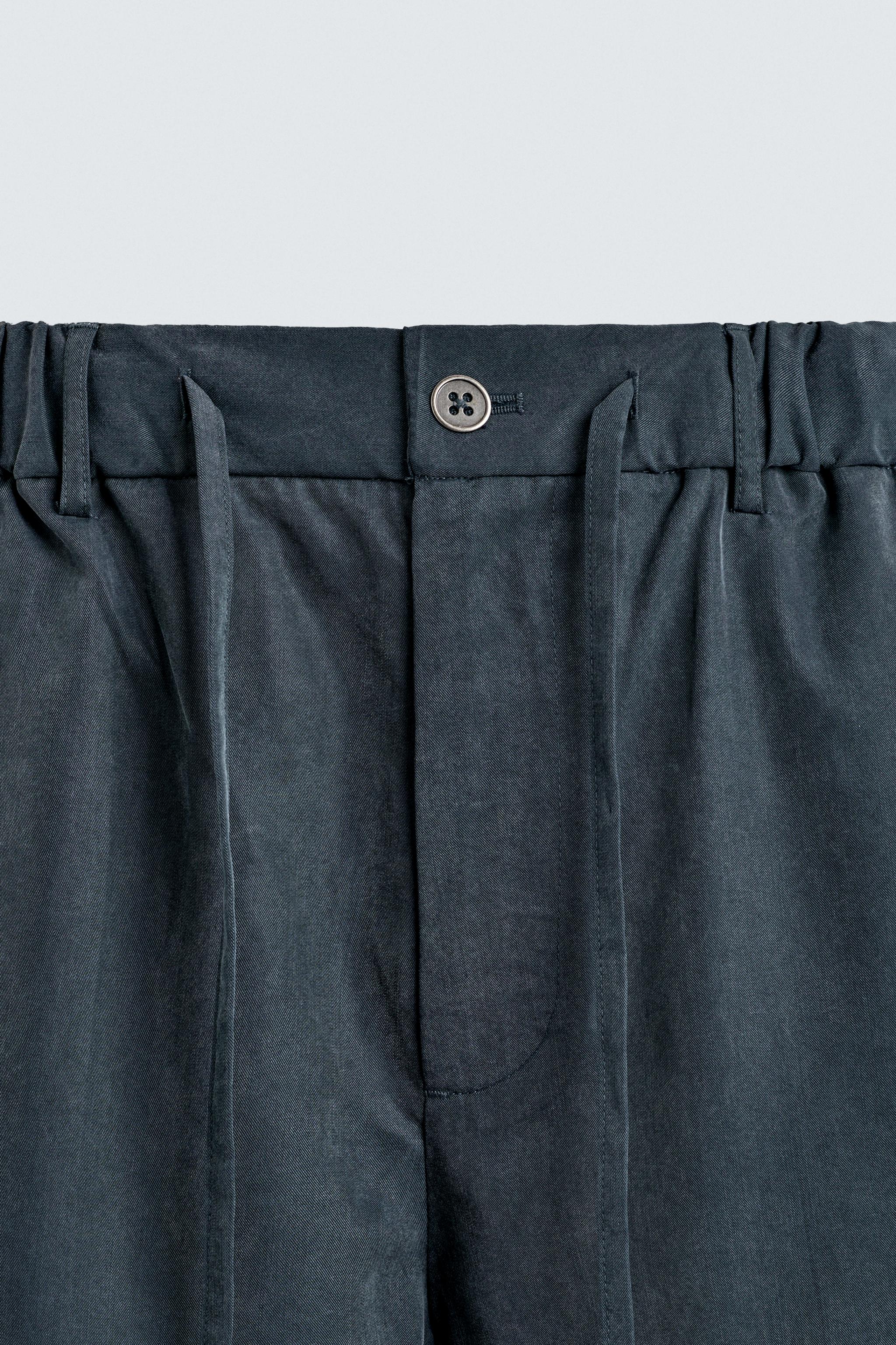 WASHED EFFECT RELAXED FIT SHORTS